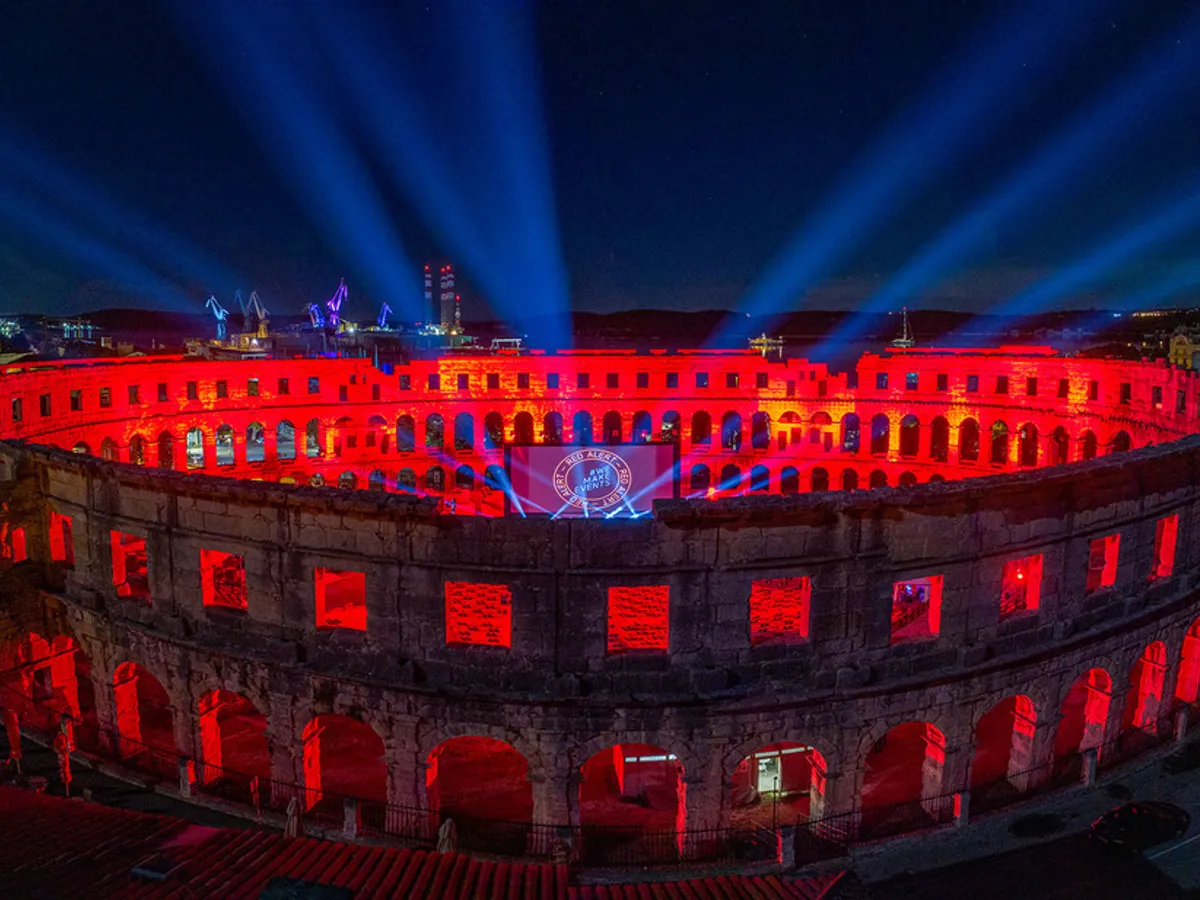 Robe Lights Pula Arena Red for #WeMakeEvents Campaign
