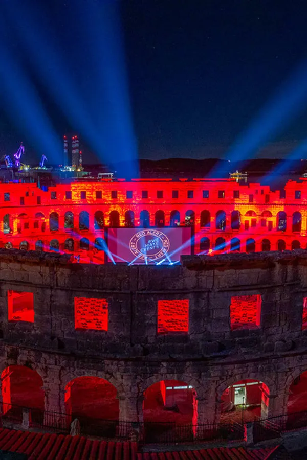 Robe Lights Pula Arena Red for #WeMakeEvents Campaign